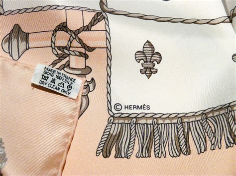 hermes gold ivory scarf tag|authentication of Hermes scarf.